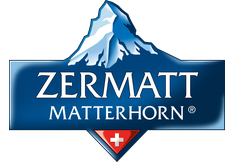 Faire de la luge a Zermatt sur une piste de luge avec remontée en train